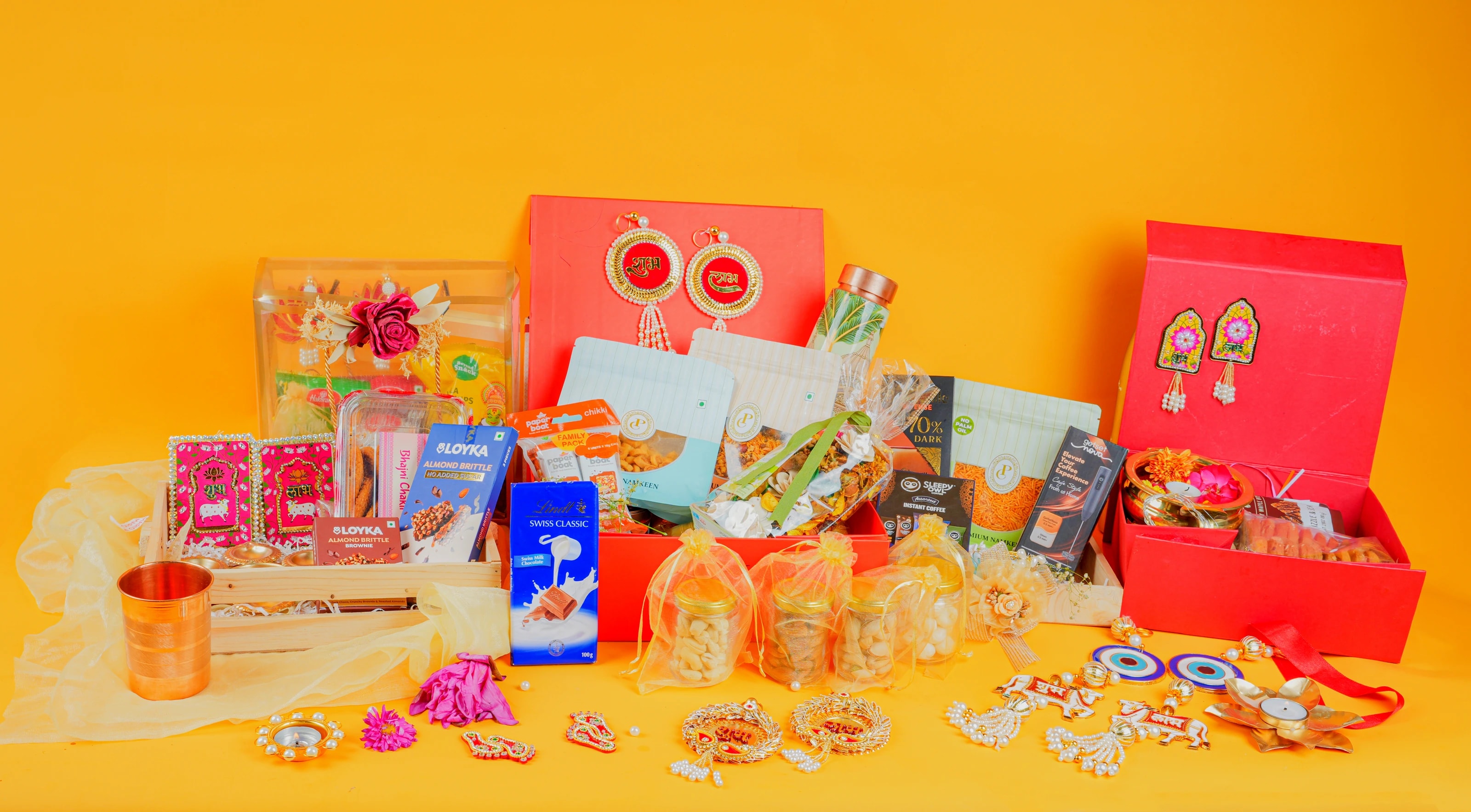 Diwali festival hamper collection — décor, dry fruits, sweets, and festive accents